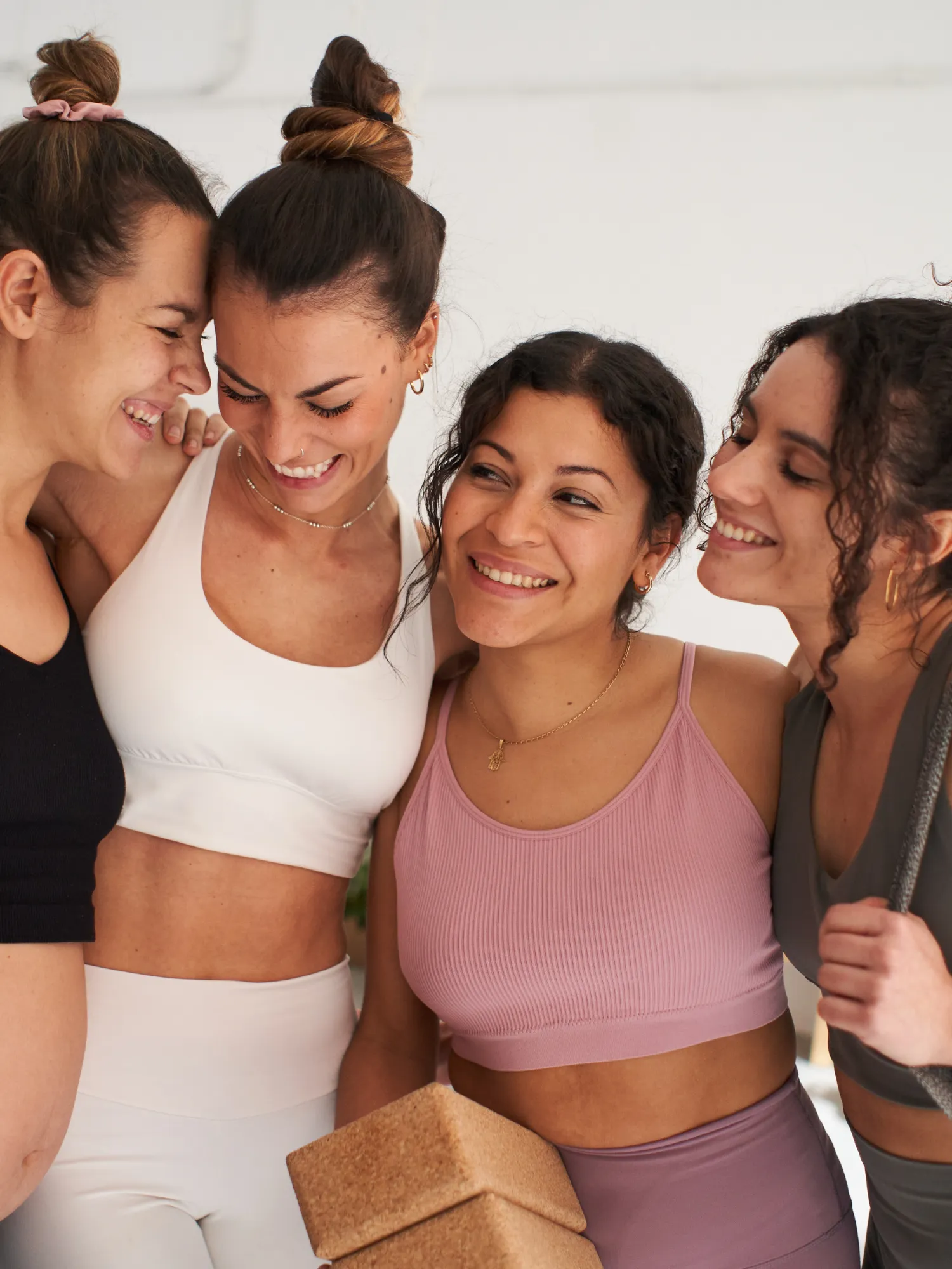 Women hugging after a workout