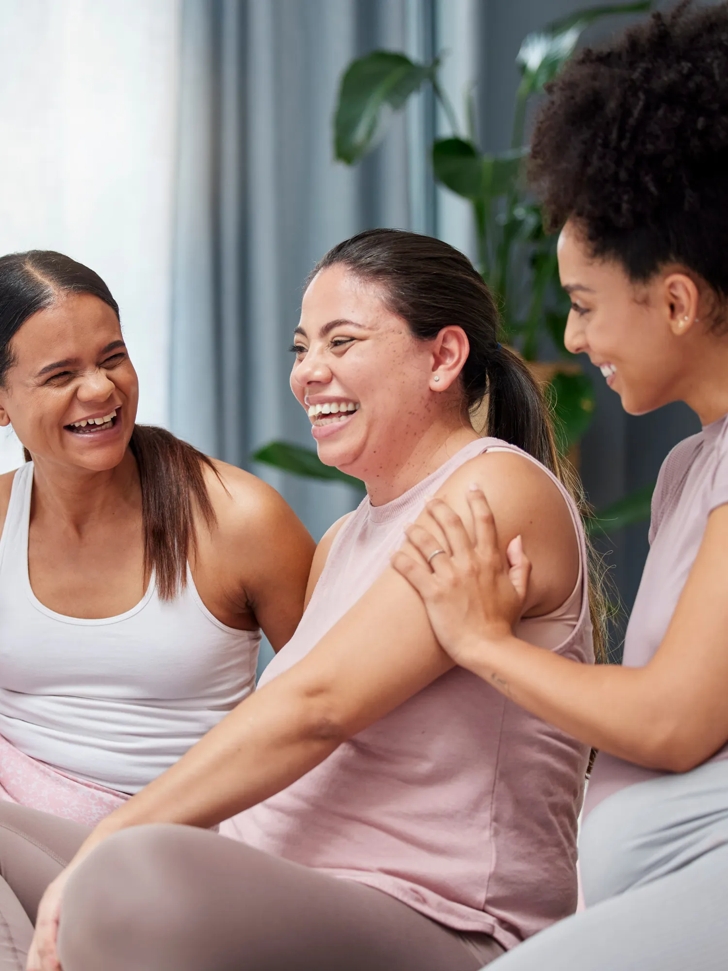 Moms laughing and supporting each other